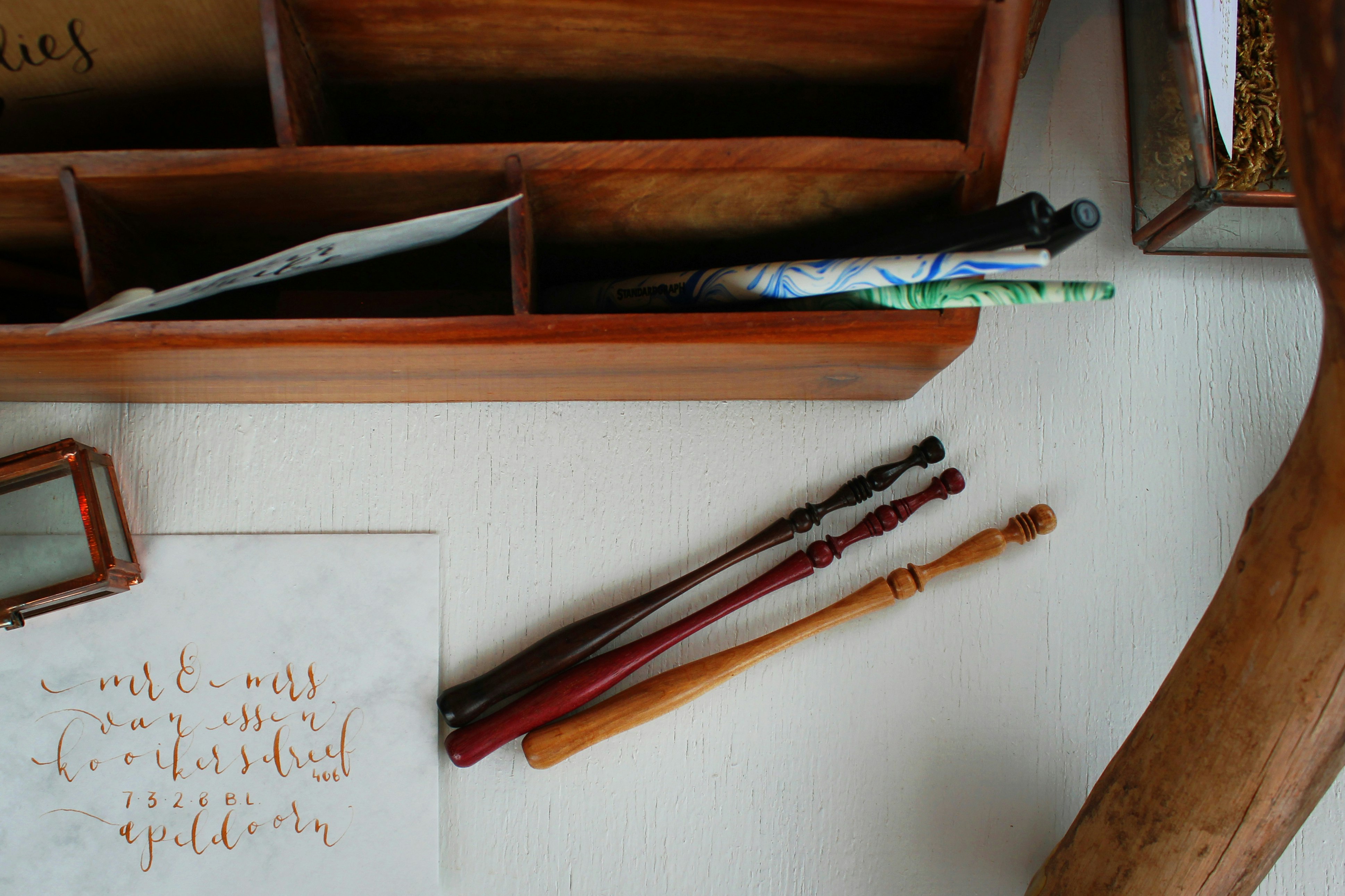 two brown and black wooden sticks